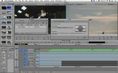 A digital video editing software interface showing a timeline, media library, and video preview windows.