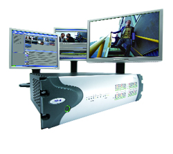 A white and grey server unit connected to three monitors showing security camera footage and data.