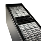 A black server chassis filled with rows of silver hard drive trays.