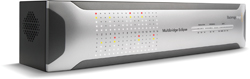 A silver and black rack-mounted server with a grid of small status lights on the front panel.