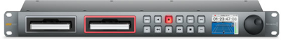 Rack-mounted device with two media slots, control buttons, a small screen displaying timecode and a waveform, and a large rot