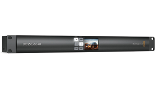 Black UltraStudio 4K video hardware with a small digital display screen in the center.