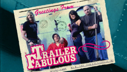 A postcard showing four people against a light blue background with pink stylized text at the bottom.