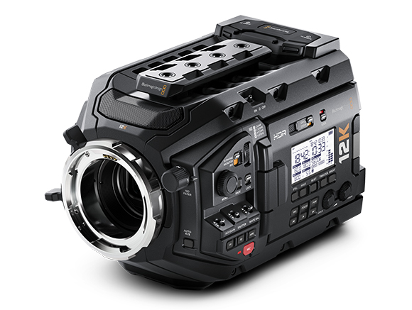 A high-end black 12K digital cinema camera with a large lens mount and various control buttons.