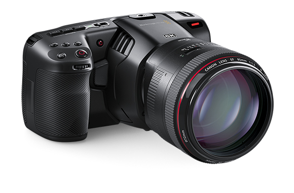 A black professional digital cinema camera equipped with a large Canon EF 85mm f/1.2 lens.