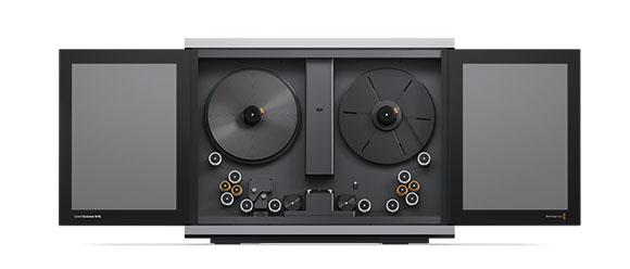A wide, rectangular film scanner with two large reels and two open side doors against a white background.