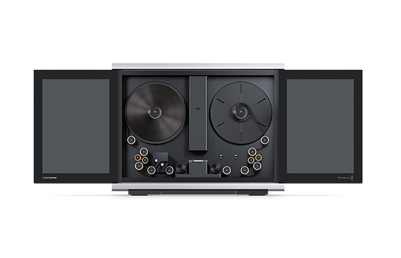 A silver and black hi-fi audio system with two large side doors open to reveal turntables and reels.