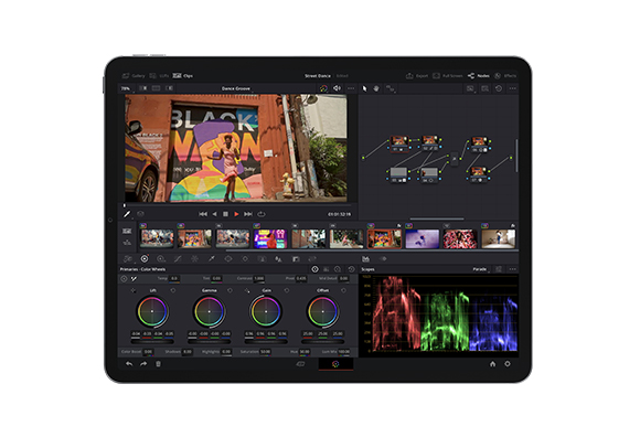 A tablet showing a video editing interface with a timeline, color grading tools, and a video preview.