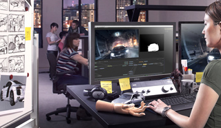 Digital artists working at computer workstations in a studio with multiple monitors and sketches.
