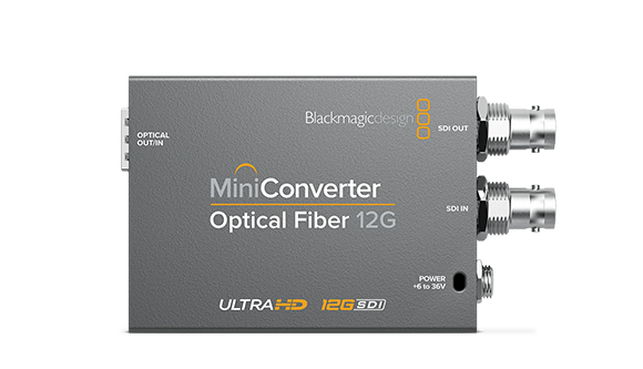 Blackmagic Design MiniConverter Optical Fiber 12G with SDI and optical ports on a dark grey metal chassis.