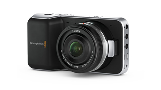 A black and silver compact digital camera with a large protruding lens.