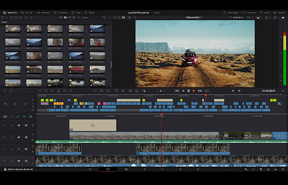 A video editing software interface displaying a media pool, a video preview of a car on a dirt road, and a timeline.