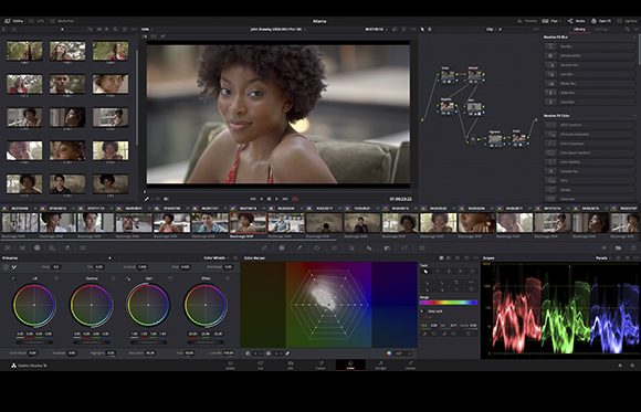 Video editing software interface displaying a woman's portrait, color wheels, and timeline.