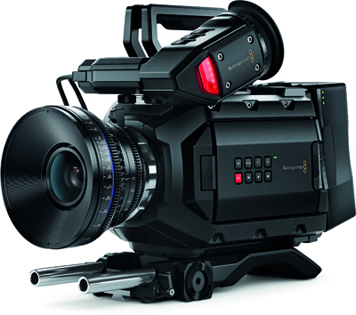 A professional black digital cinema camera with a large lens and various control buttons.