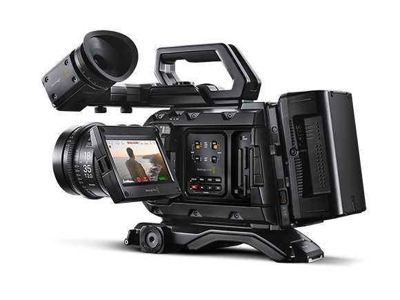 Black professional cinema camera with a large lens, side-mounted monitor, and top handle.