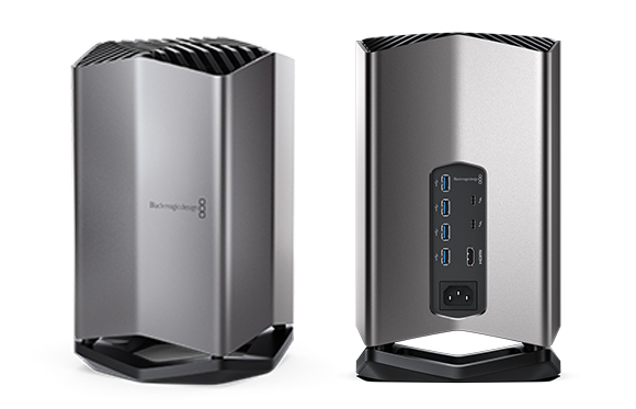 Two views of a silver, vertical Blackmagic Design hardware device with various ports on the back.