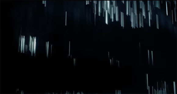 Vertical white light streaks falling through a dark, black void.