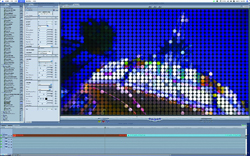 A software interface showing a blue grid with a multicolored pixelated pattern and control panels.