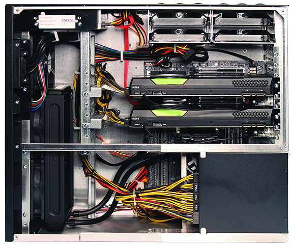 Internal view of a server chassis showing circuit boards, power cables, and storage drives.