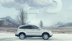 A silver SUV parked in a snowy field with mountains and large white numbers in the cloudy sky.