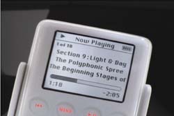 A white digital media player screen showing track information for Section 9: Light & Day.
