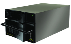 A black rectangular electronic device with a front handle and a small green status light.