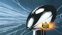 A black and white American football surrounded by bright, radiating white light streaks against a blue background.