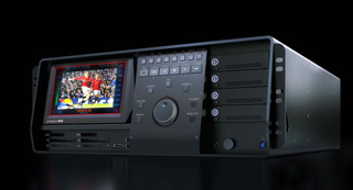 A black professional video editing workstation featuring an integrated screen displaying a sports broadcast.