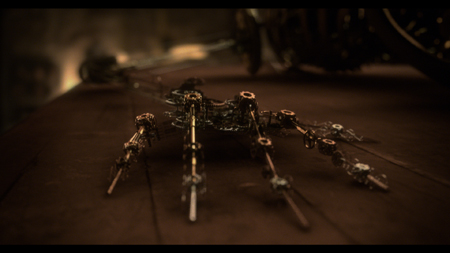 Intricate mechanical assembly of gears, rods, and metal components resting on a dark wooden surface.