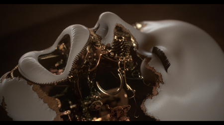 A white sculptural face cracking open to reveal intricate gold gears and mechanical parts inside.
