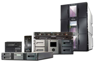 A collection of black server towers, rack-mounted units, and storage hardware against a white background.