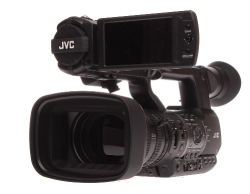 A black JVC professional video camera with a large lens and an articulated screen.