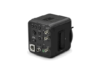 A black cube-shaped professional video camera module with multiple input and output ports on its side.