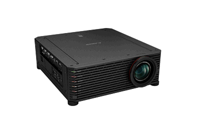 A black rectangular professional projector with a large lens and cooling vents on a white background.