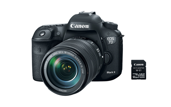 Canon EOS 7D Mark II DSLR camera with an 18-135mm lens and a small Wi-Fi adapter.