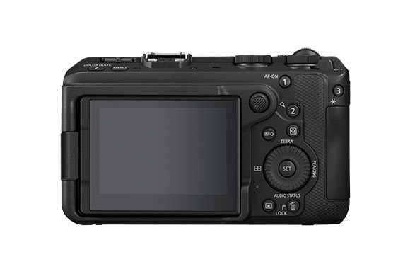 Rear view of a black digital camera showing the LCD screen, control buttons, and a circular dial.