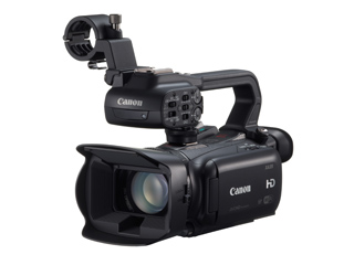 A black Canon professional video camera with a top handle and tripod mount.
