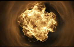 A bright, swirling mass of golden light and smoke centered in a dark, circular void.