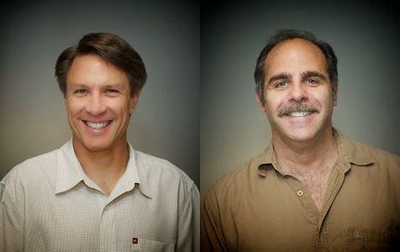 Two headshots of smiling men, one with dark hair in a white shirt and one with salt-and-pepper hair and a mustache.