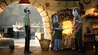 Three skeleton characters in a rustic kitchen near a glowing oven.