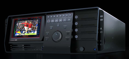 A black professional video editing workstation with a screen displaying sports footage and several drive bays.