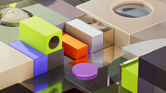 An arrangement of various colorful 3D geometric blocks and shapes in different textures and colors.