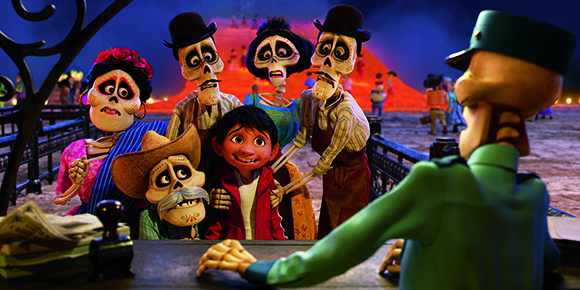 Animated skeletons and a young boy sit at a desk facing a man in a green military uniform.