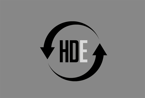 Black and white HDE text centered within two curved arrows forming a circle on a gray background.