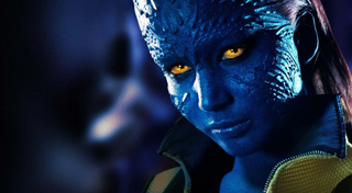 Close-up of a blue-skinned humanoid with textured skin and glowing yellow eyes looking forward.
