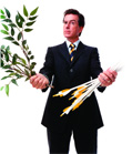 A man in a dark suit holding a green leafy branch in one hand and several arrows in the other.