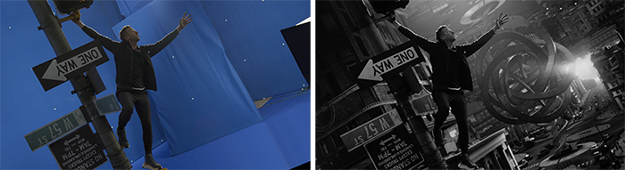 A man reaches toward the sky in front of a blue screen and a black and white city scene with a floating ring.