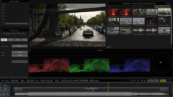 A video editing software interface with a main preview window, media bin, audio waveforms, and timeline.