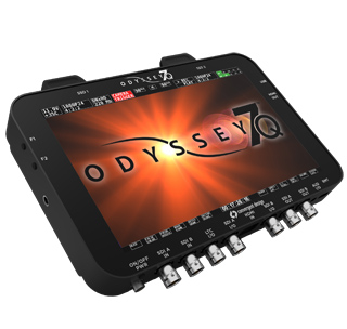 A black Odyssey 7Q professional monitor with various input and output ports along the bottom edge.