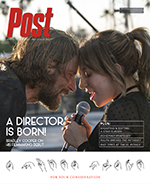 A man and a woman with their foreheads touching hold a microphone between them. Text reads "Post" and "A DIRECTOR IS BORN!".